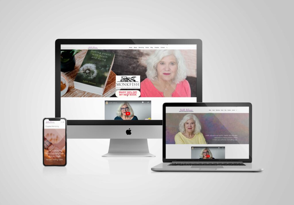 two computers and a smartphone with judith johnson website on screen